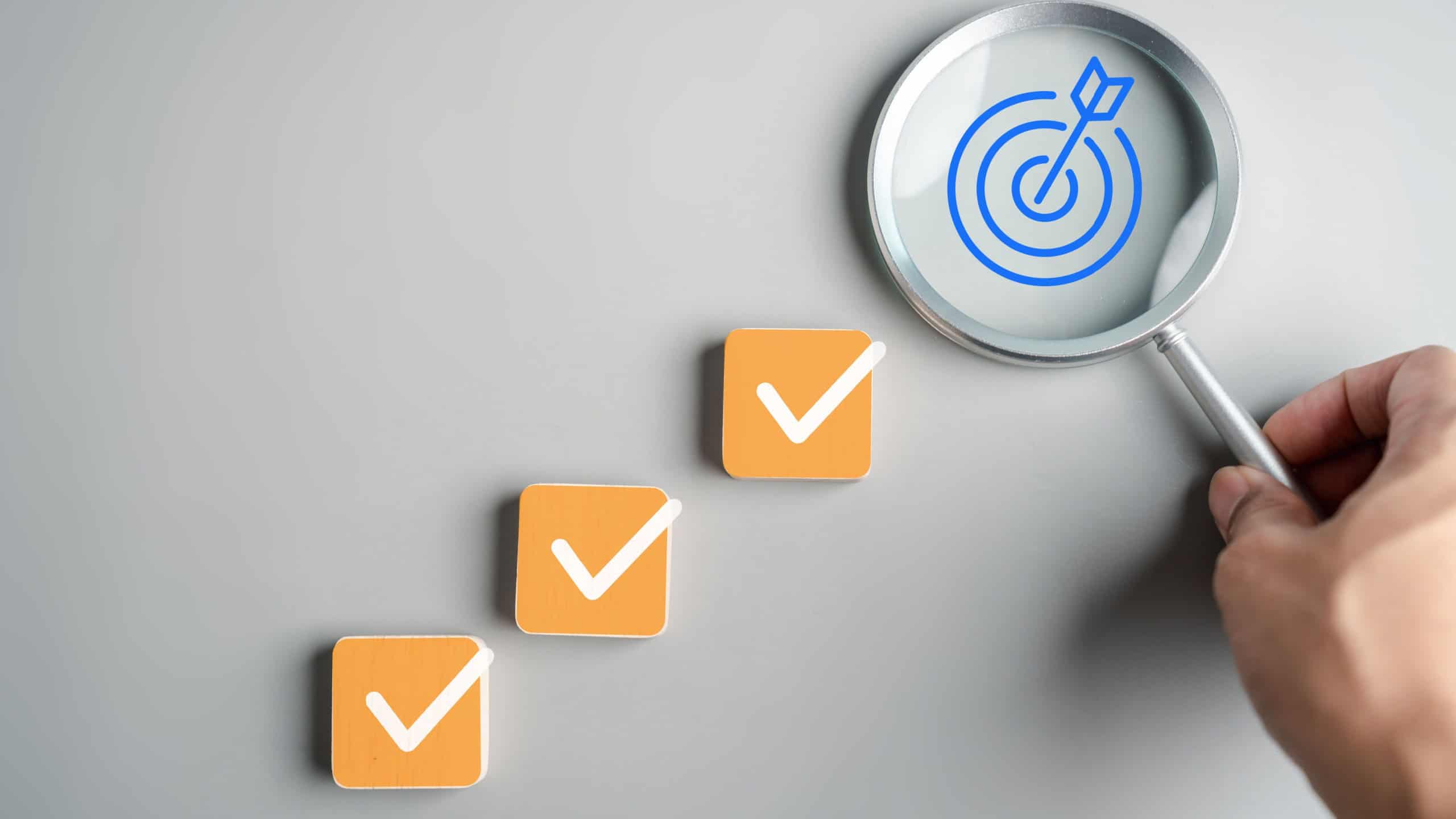Planning checklist goal target in magnifying glass, project planning, strategic objectives, task completion, business focus, and goal setting.