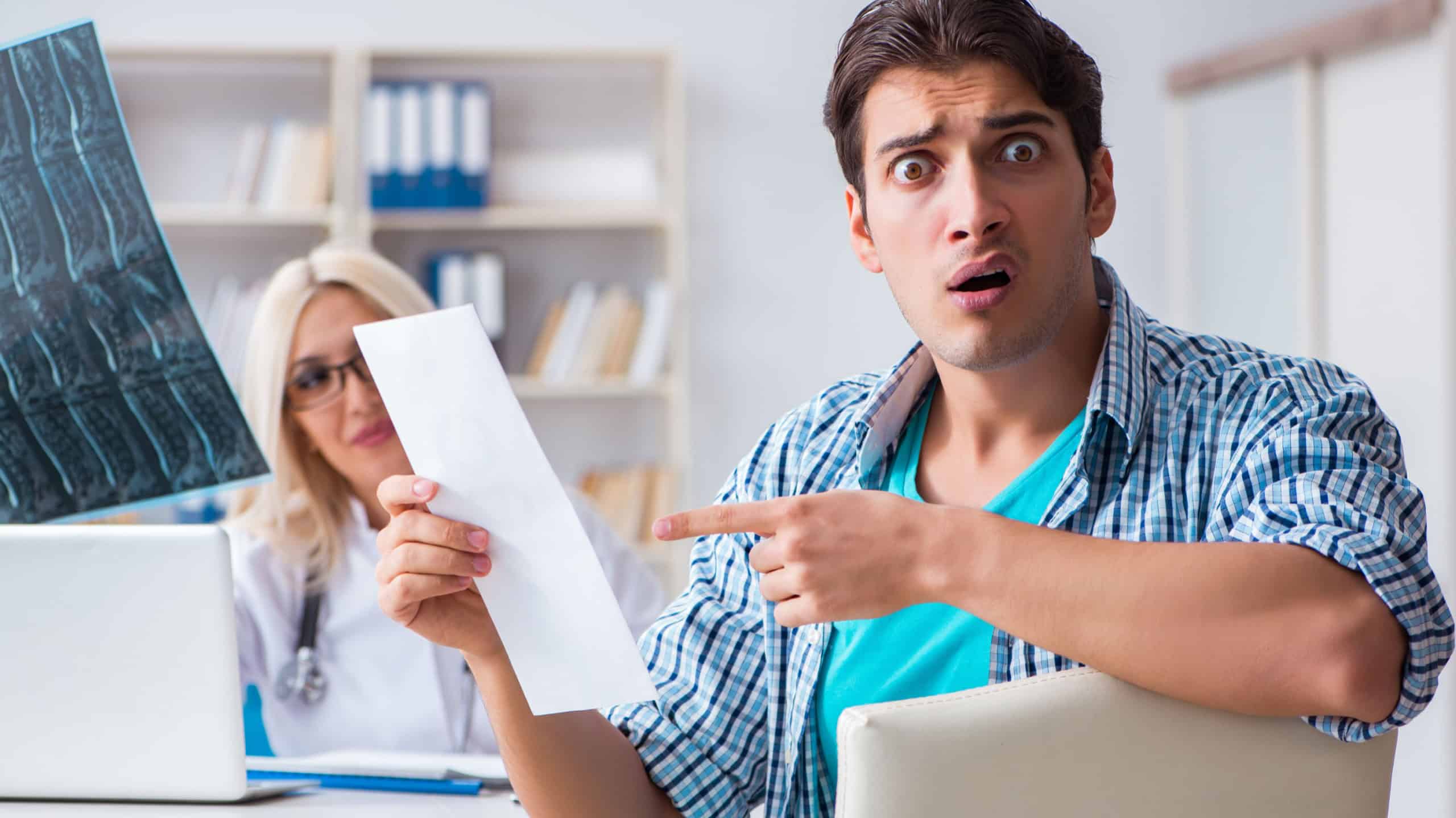 Male patient angry at expensive healthcare bill
