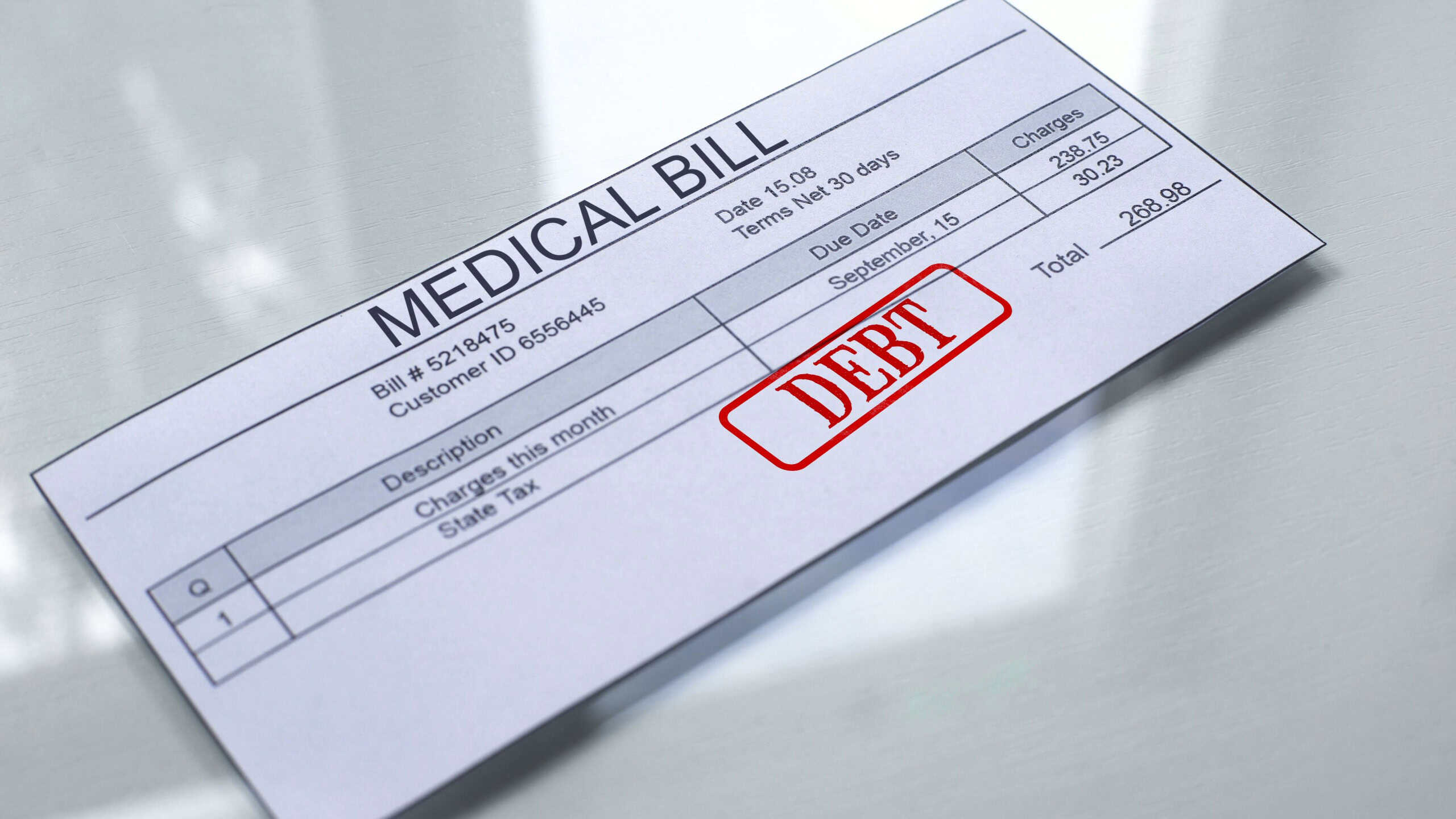 Medical bill debt, seal stamped on document, payment for services, tariff