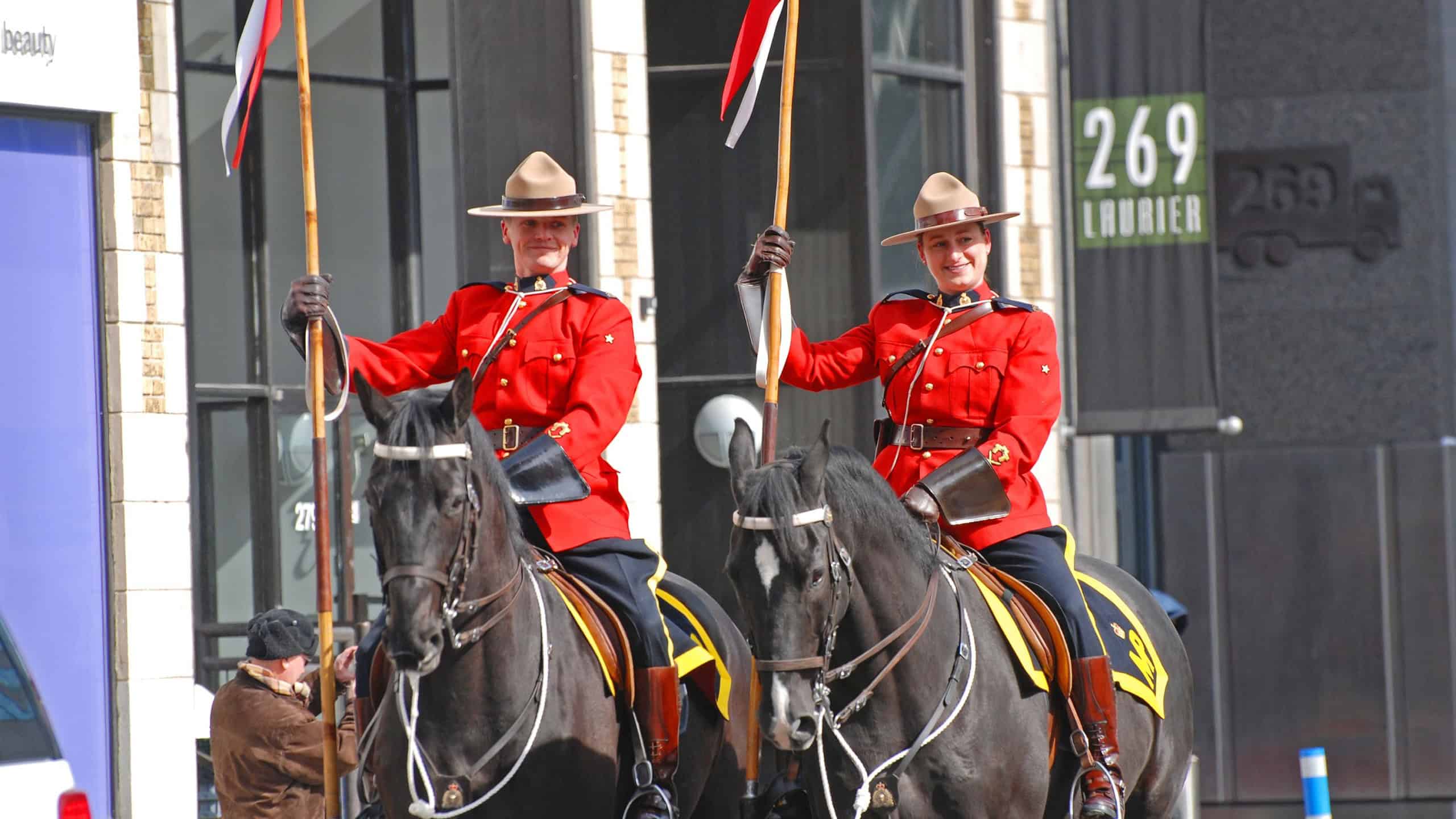 Ottawa, Canada - Mar. 10, 2012: RCMP riding in Saint Patrick's Day Parade in Ottawa, Canada.
