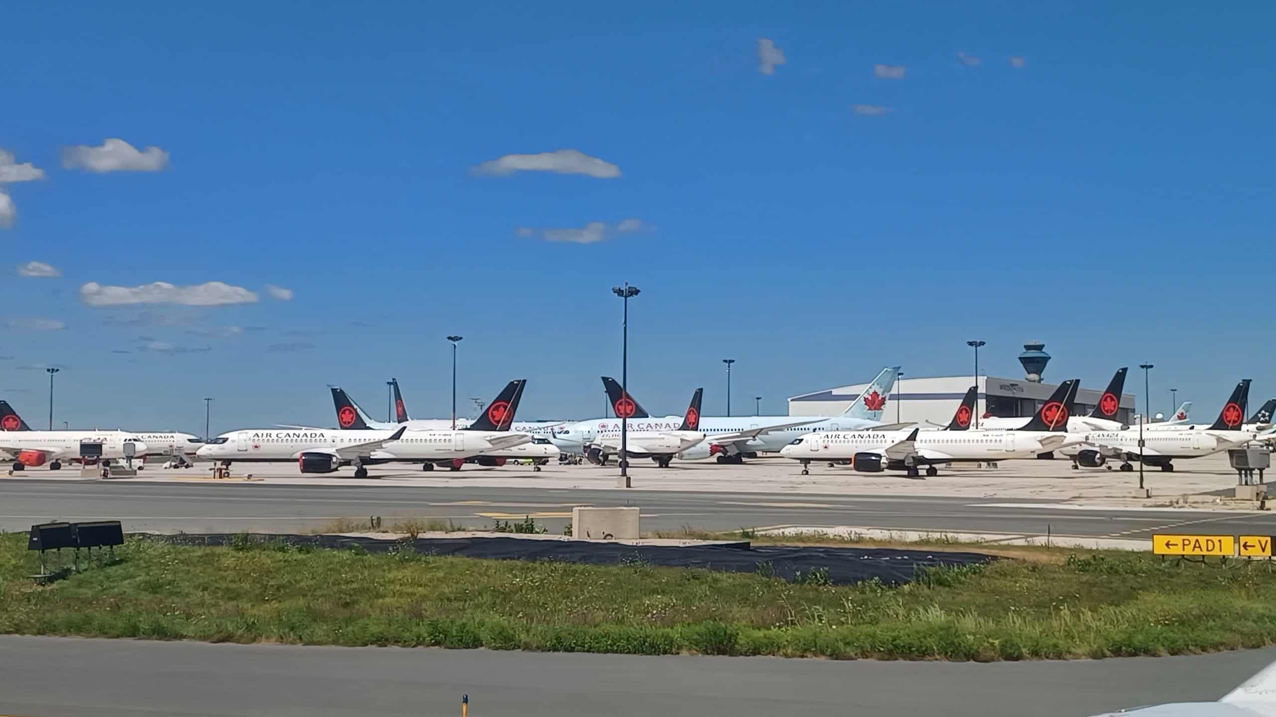 everal Air Canada airplanes stand on the tarmac at Pearson International Airport because of strike