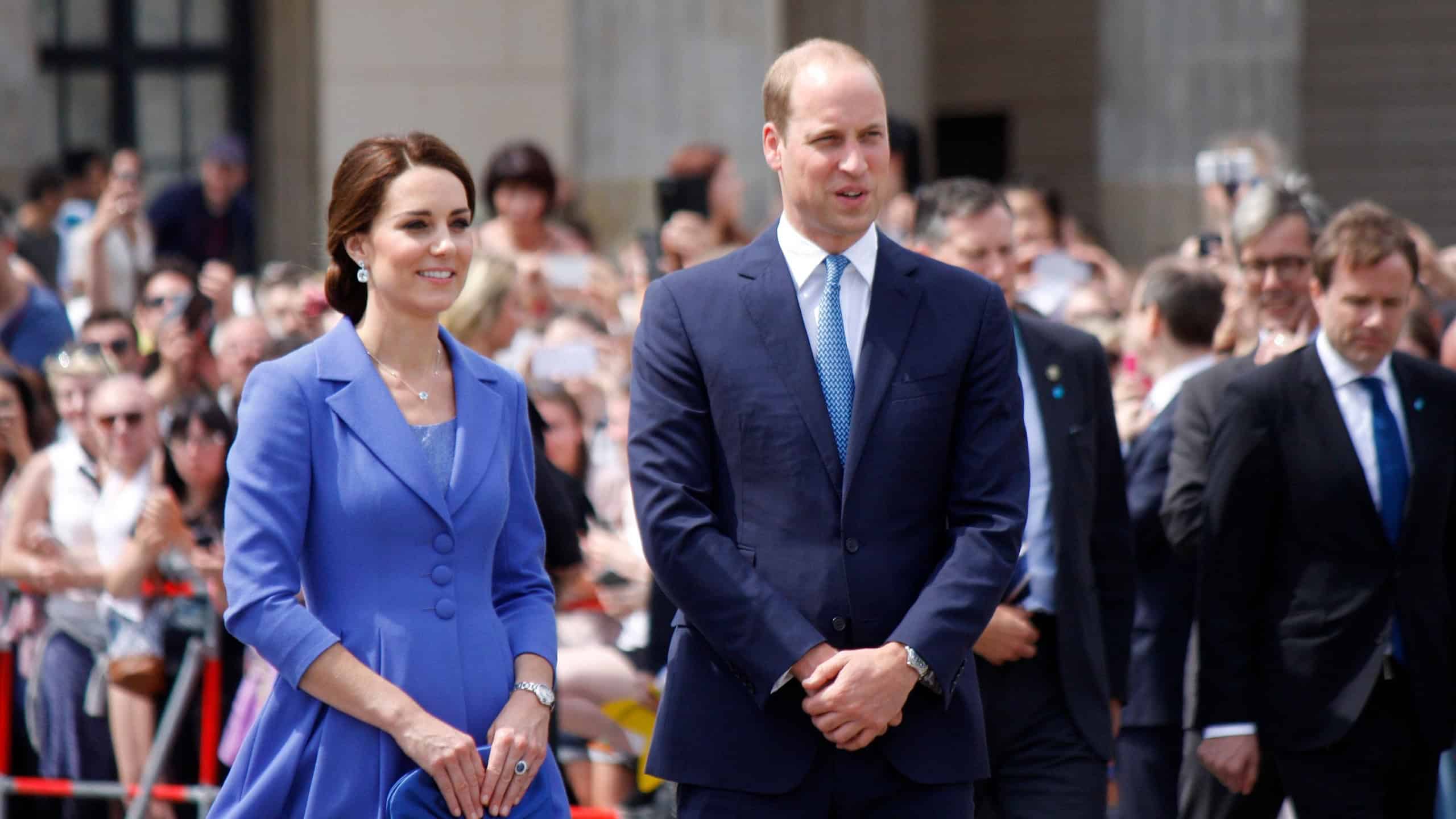Prince William with Kate - the British Royal couple in front of the Brandenburg Gate, Berlin.