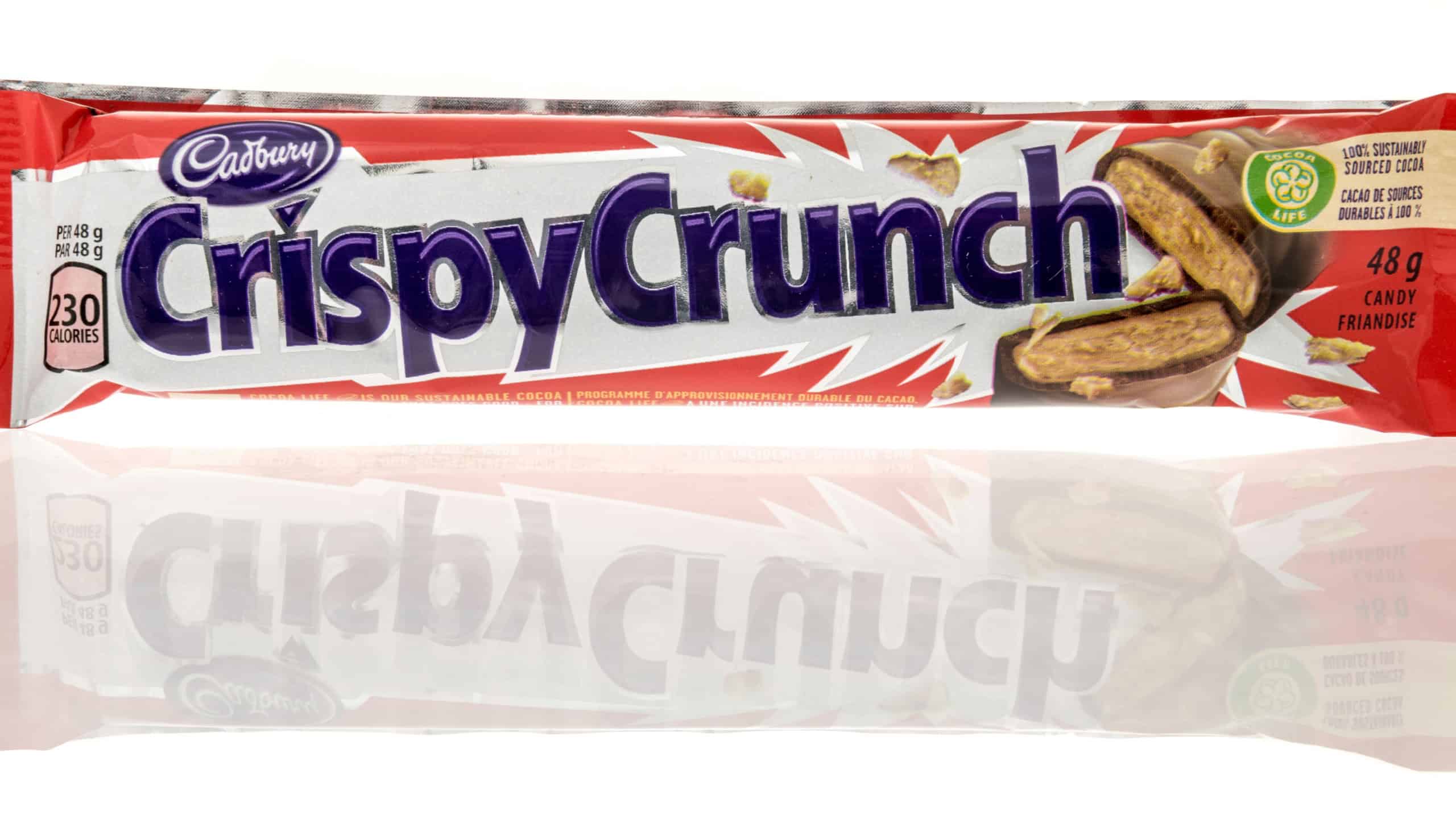 Winneconne, WI - 9 January 2024: A package of Cadbury Crispy Crunch candy bar on an isolated background.