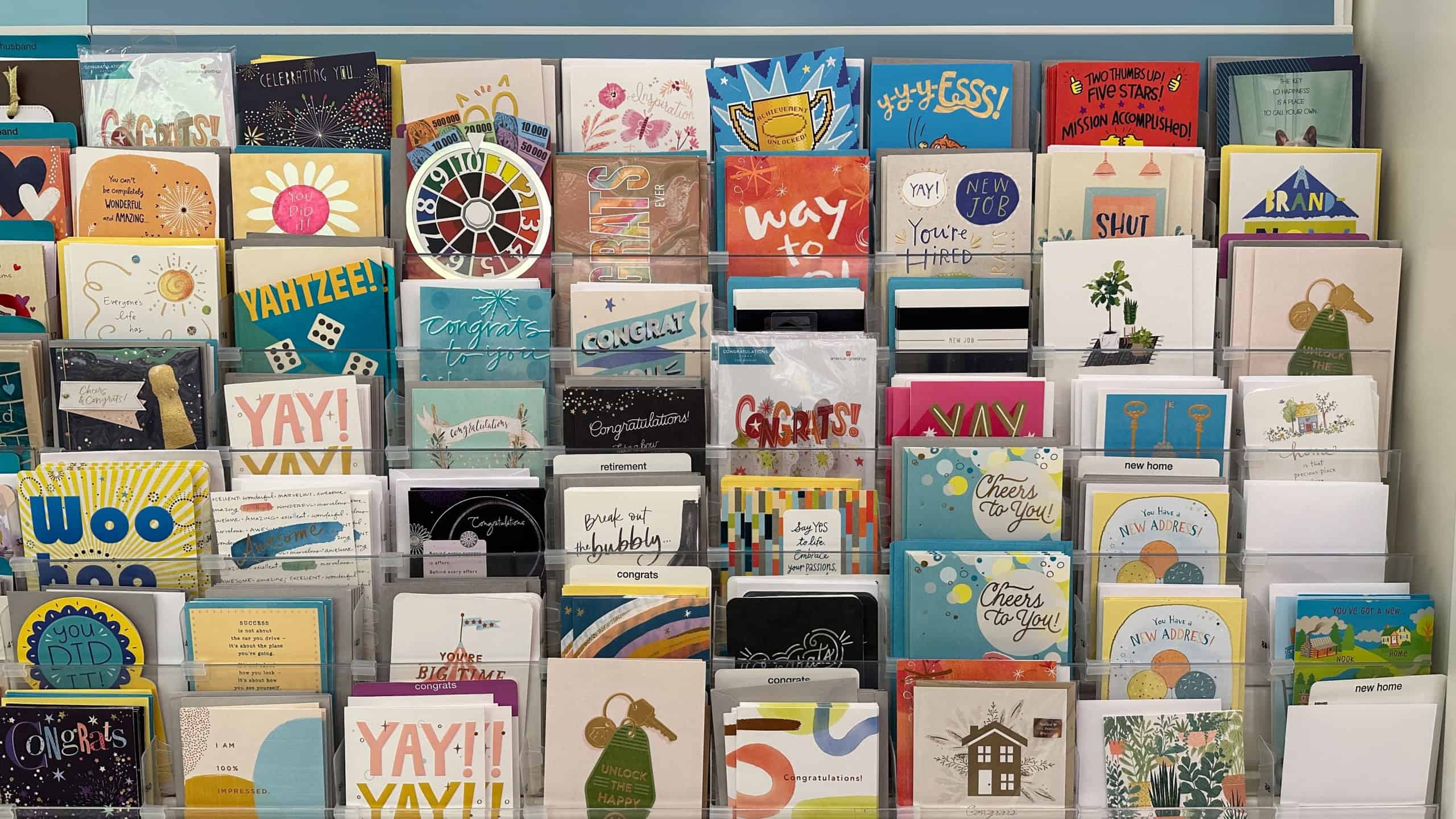 Wixom, Michigan, USA - Sep 21, 2024 : The shelves are filled with a wide variety of congrats cards featuring colorful designs and messages for all ages and occasions at Target retail store.