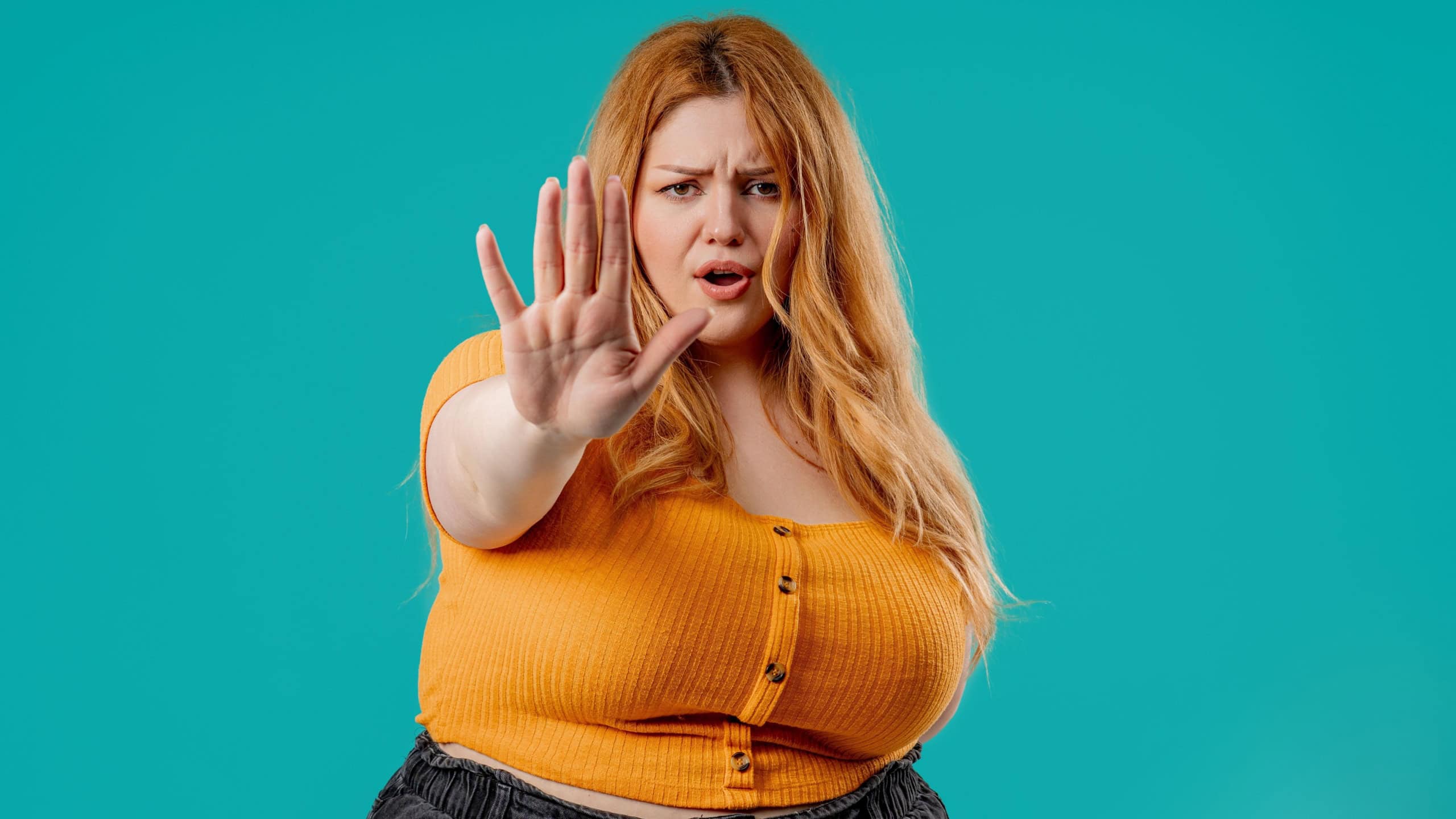 Uninterested curvy, full figured woman Disapproving With No Hand Sign. Denying, Rejecting. High quality