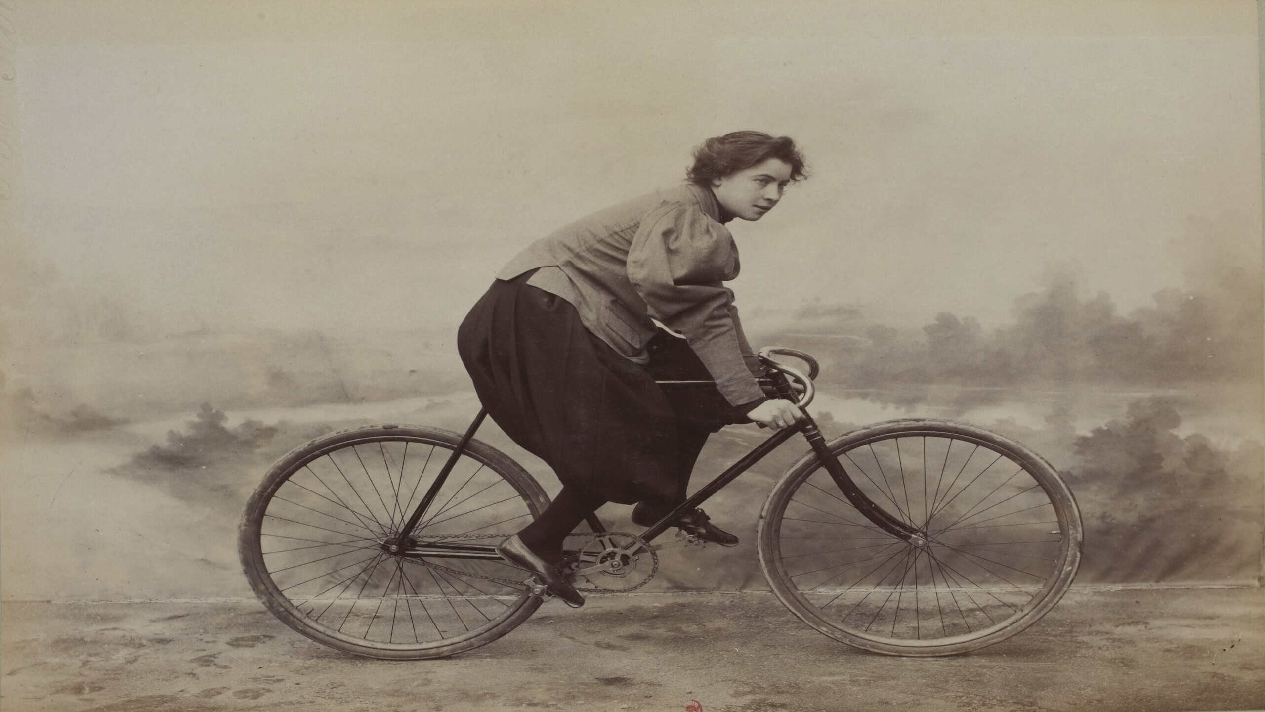 French Racing Cyclist Marie Tual Wearing Bloomers on a Racing Bike in 1896 or in 1897 