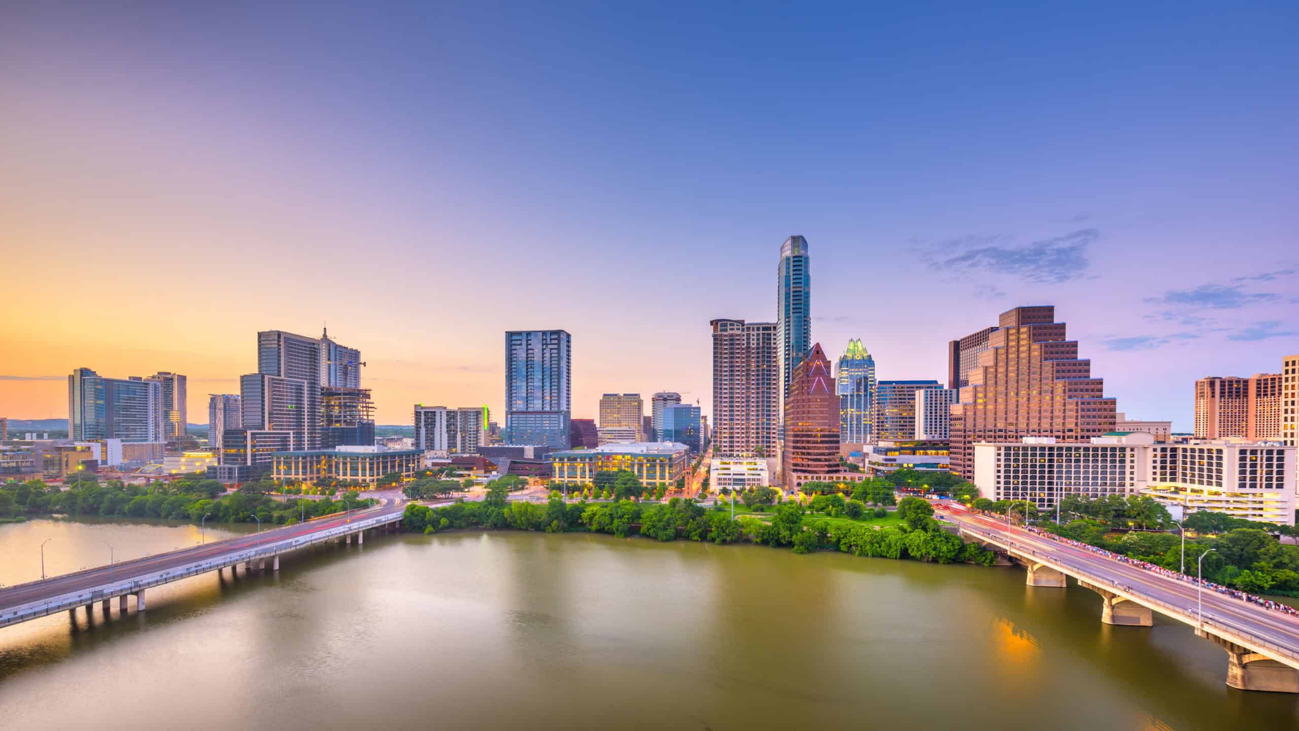 Austin, Texas, USA downtown city skyline on the Colorado River at dusk.