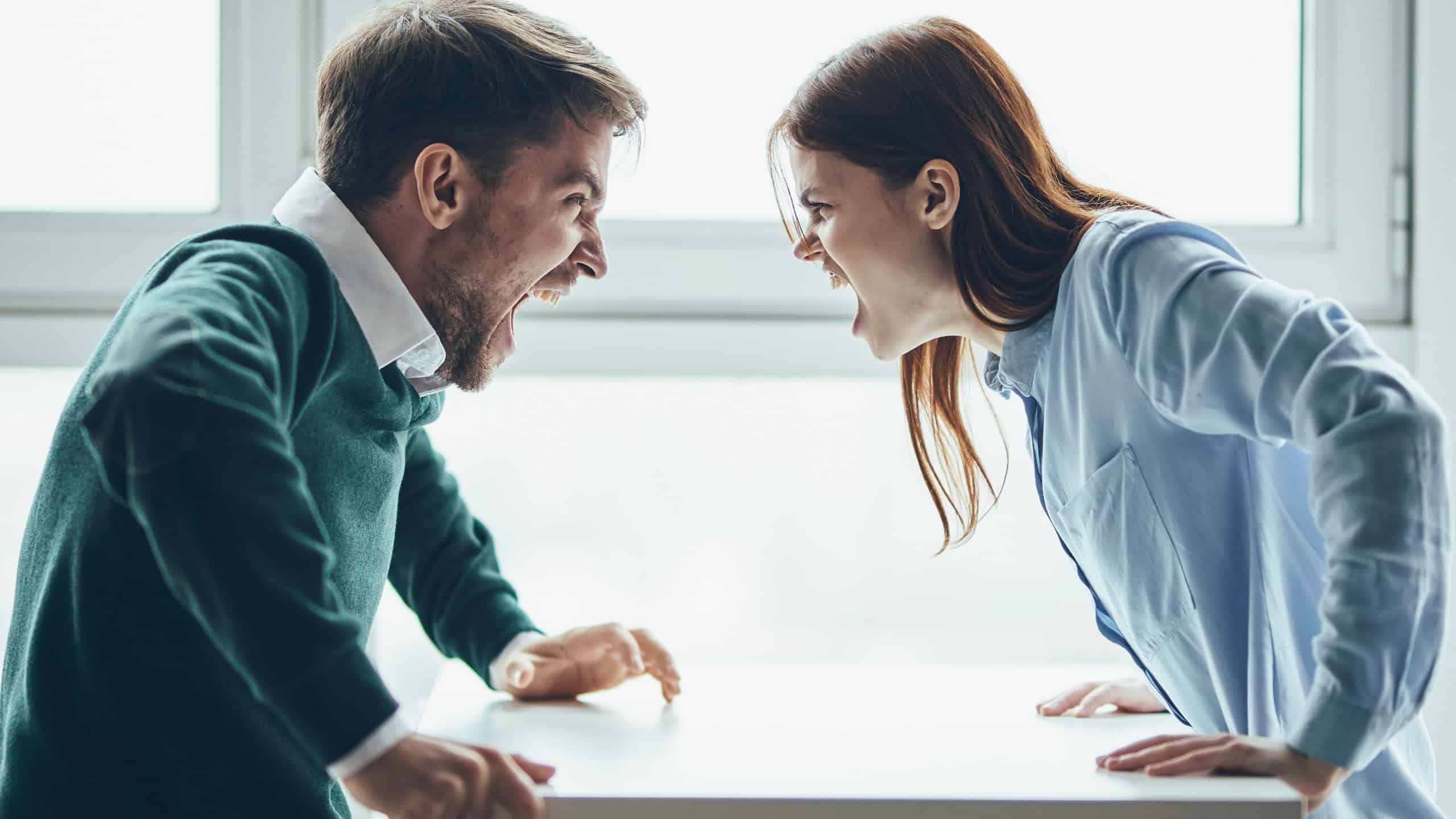 Emotional man and woman scream communication divorce conflict