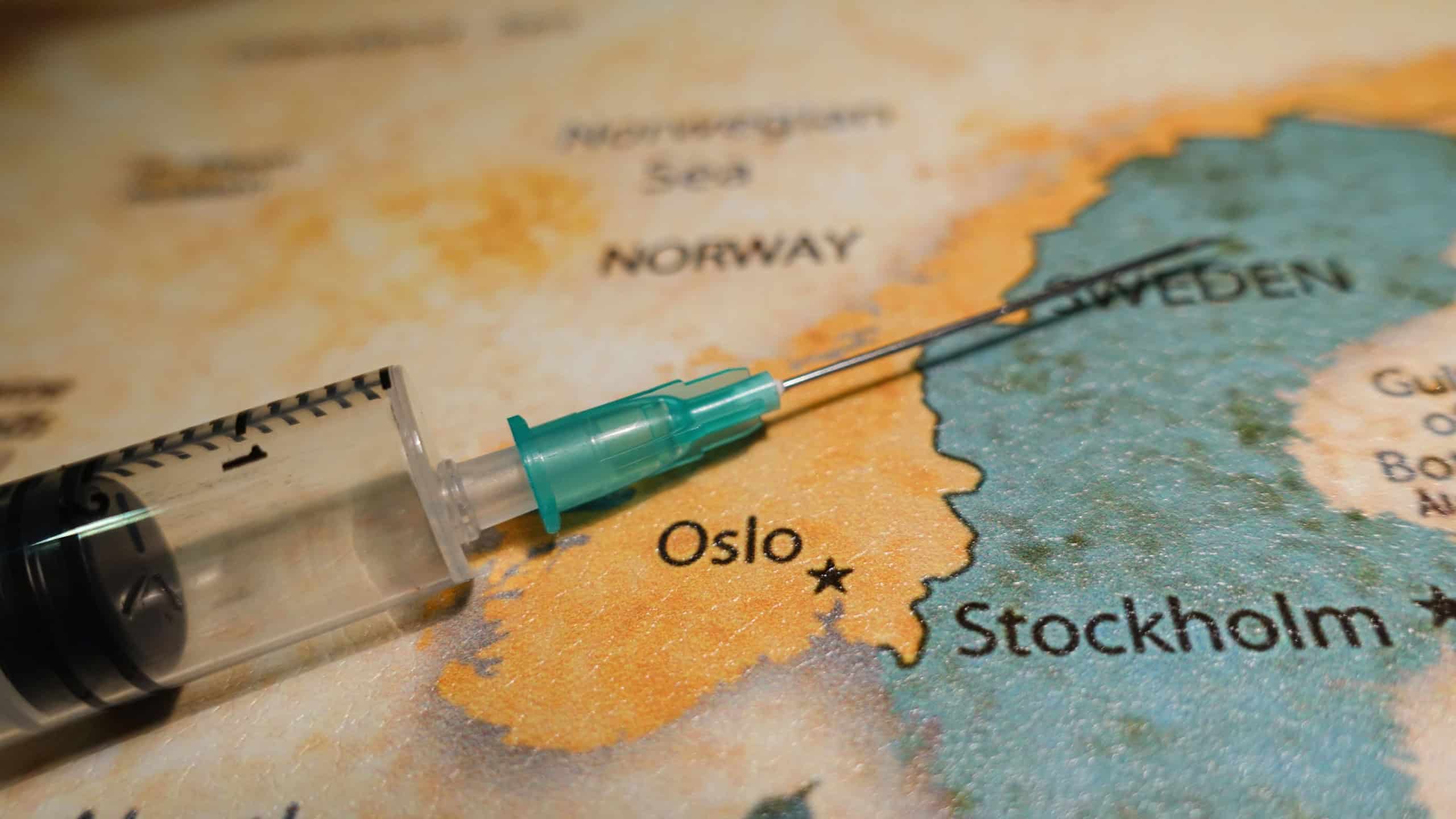 Syringe on a map of the Norway.