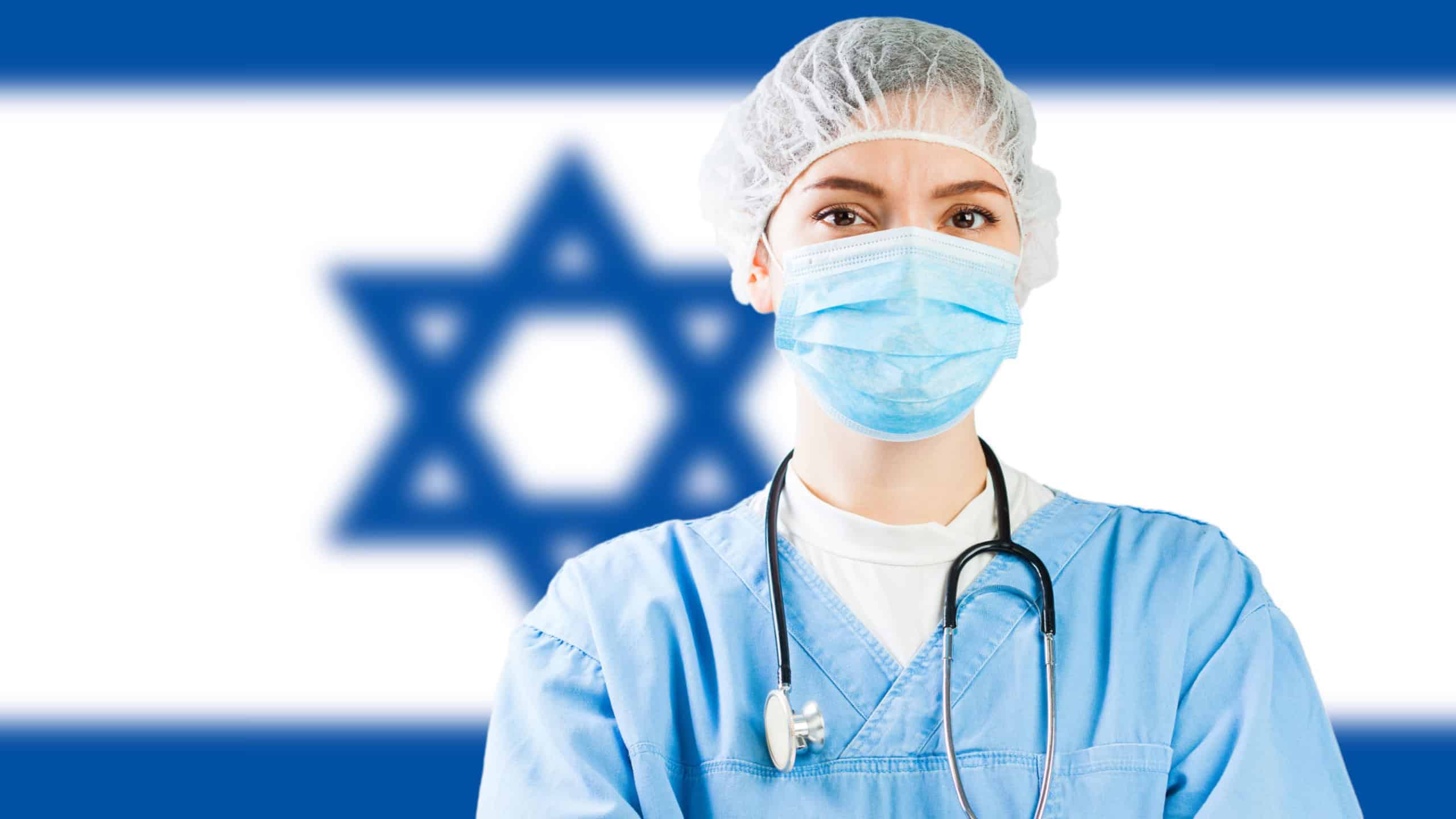 Portrait of female doctor with flag of Israel in background,COVID-19 virus disease crisis,new Coronavirus variant global worldwide pandemic,social distancing isolation,healthcare quarantine concept