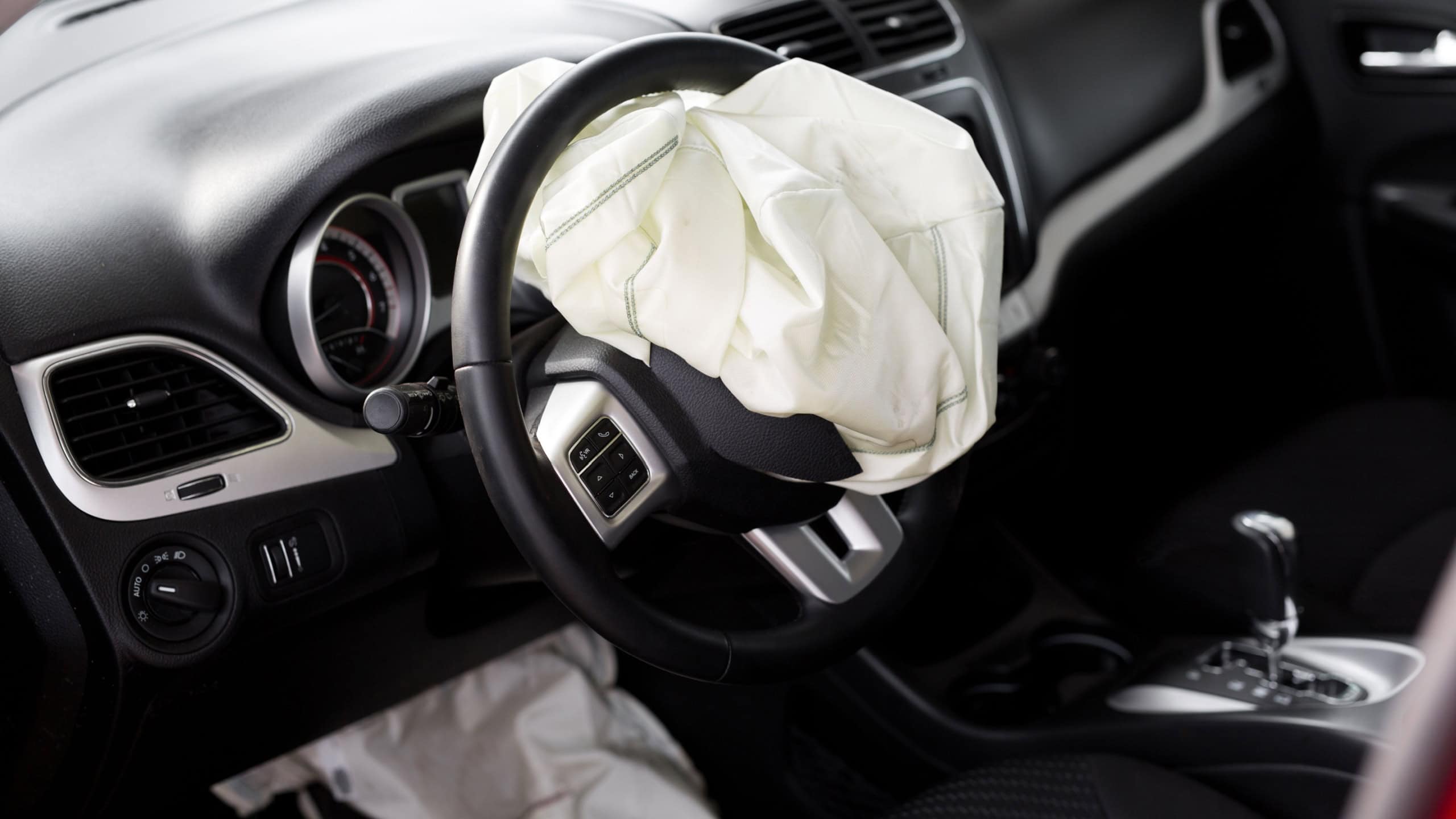 Airbag exploded at a car accident. Car Crash