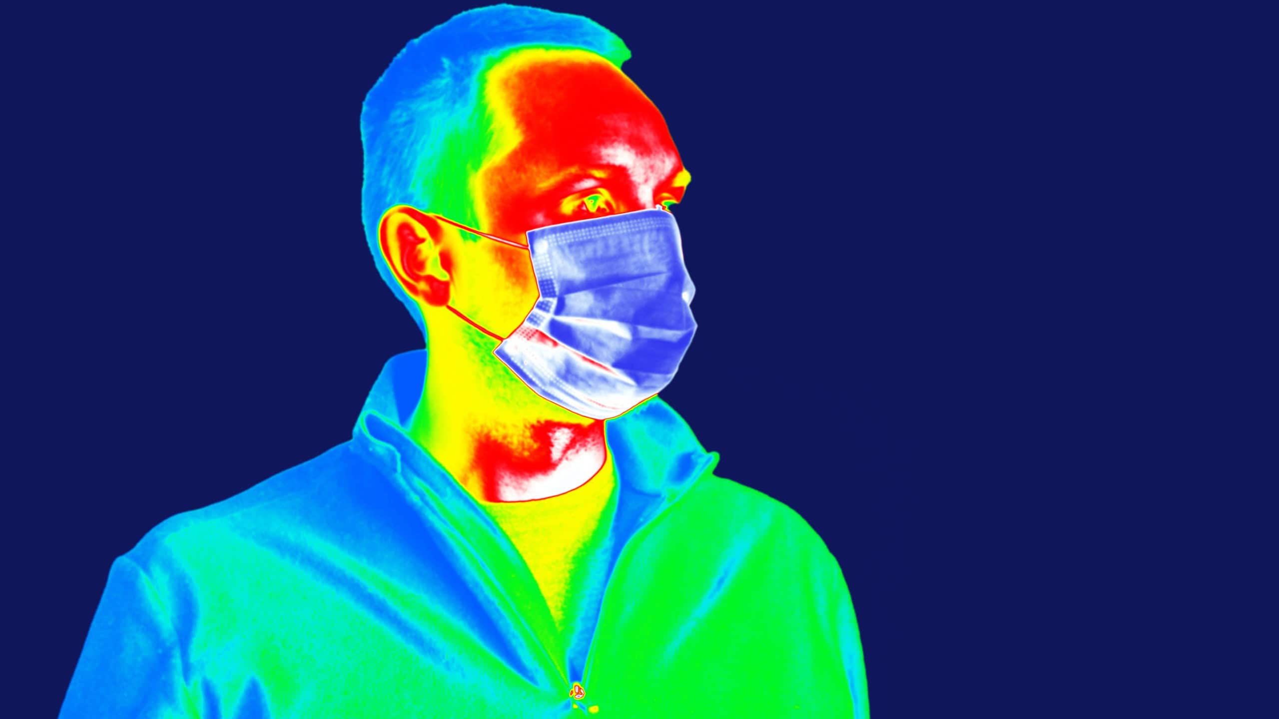 Thermal scanner, camera detecting infected people with Covid19. People under thermal imaging camera. Modern airport checking system.