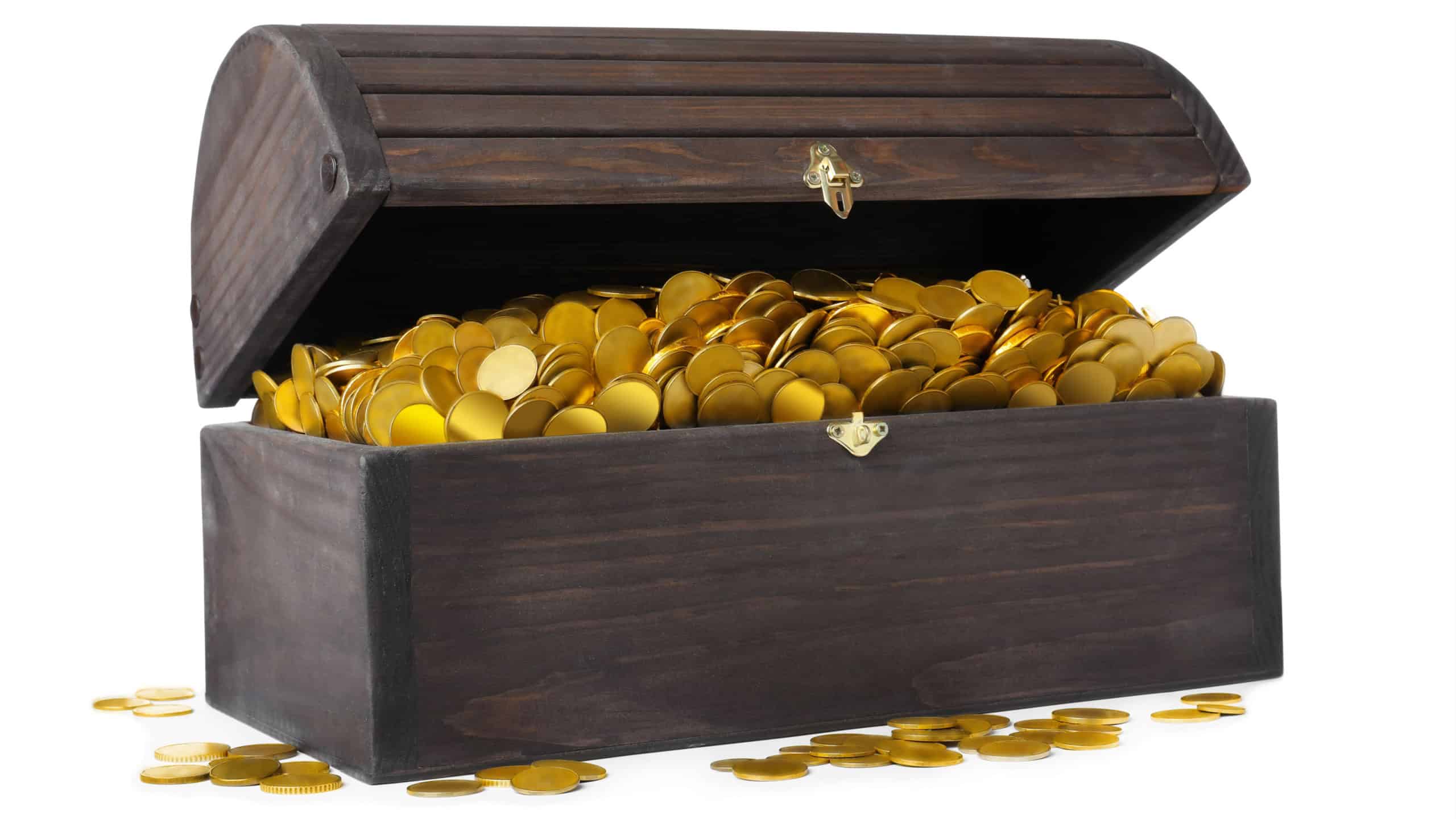 Open treasure chest with gold coins isolated on white