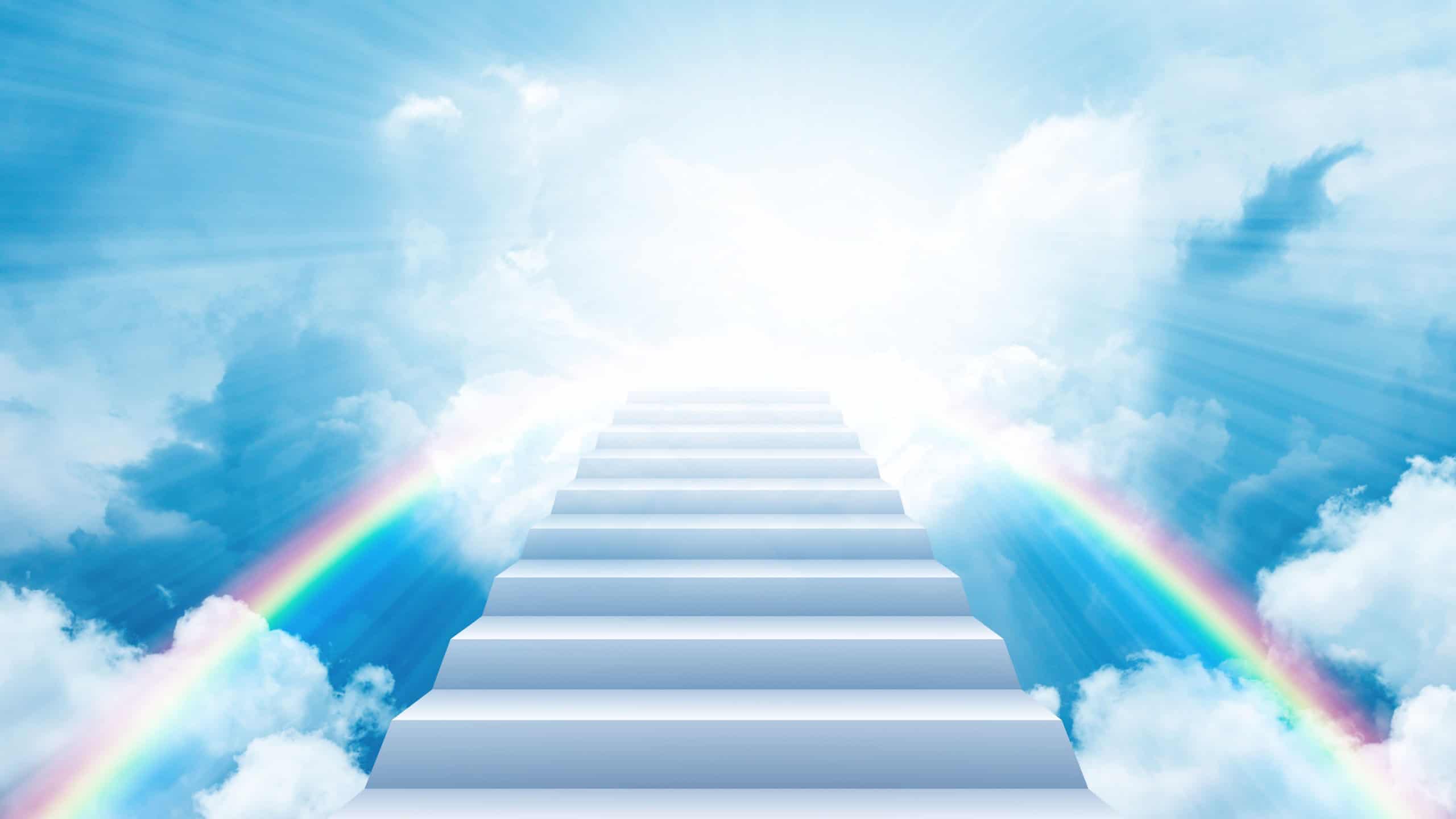 Stairs in the sky. Ascension and heaven concept. Stairs rising towards the light in the sky among the clouds.