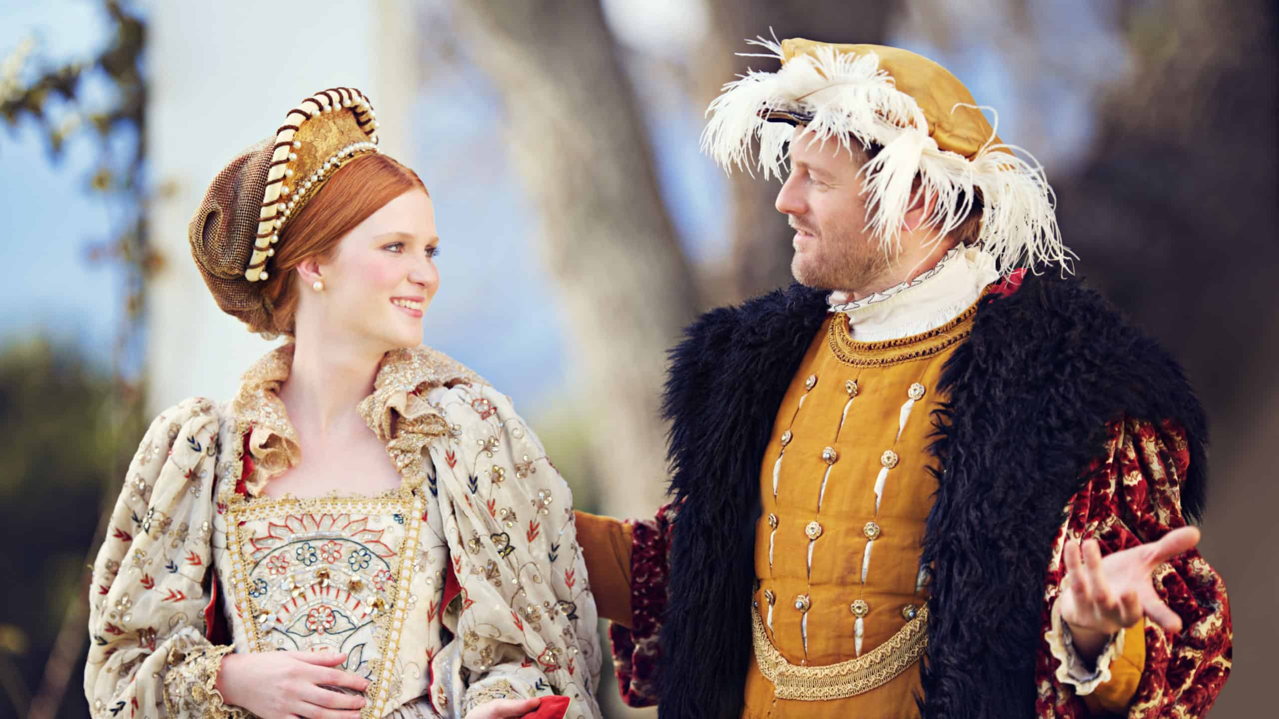 Medieval, king and couple in history with renaissance fashion outdoor with marriage and love. Vintage, garden and royal leader with queen together on a lawn with conversation and theater costume