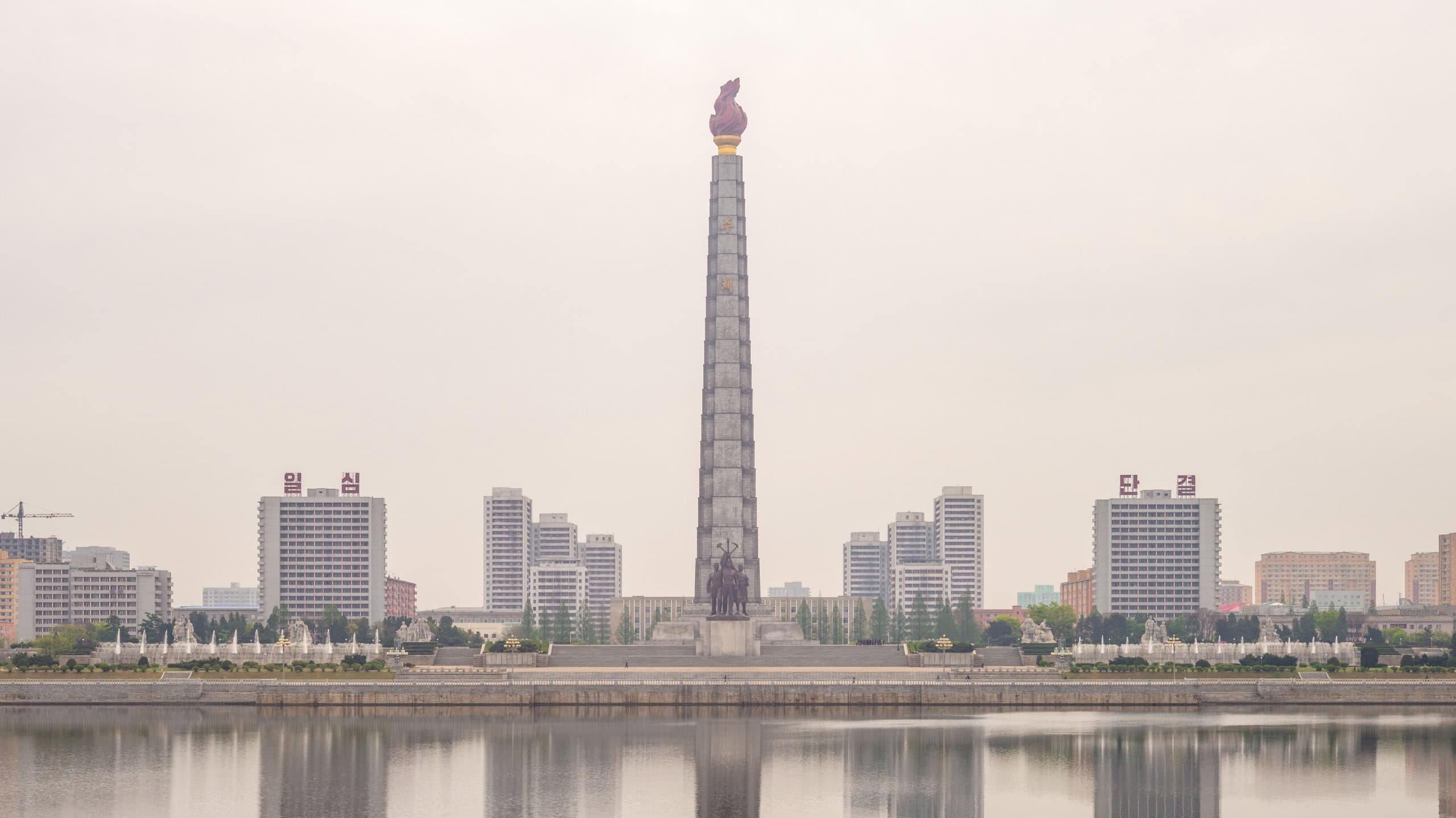 April 29, 2019: the Juche Tower and the accompanying monument to the Workers Party of Korea located in Pyongyang, the capital of North Korea. The juche tower was completed in 1982.