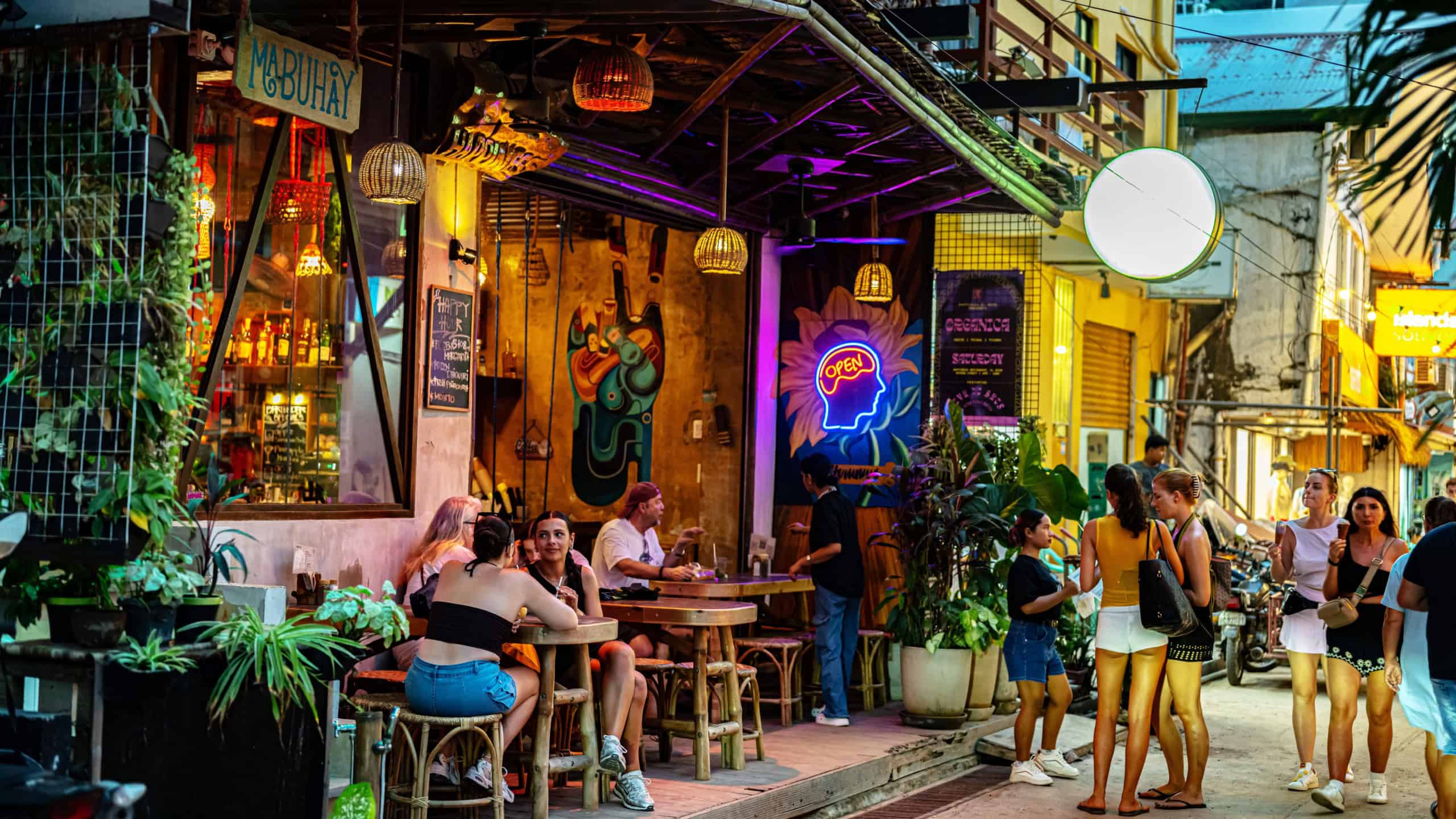 EL NIDO, PHILIPPINES - JAN 26, 2025: Street night view of the tourist quarter of El Nido, Palawan, Philippines