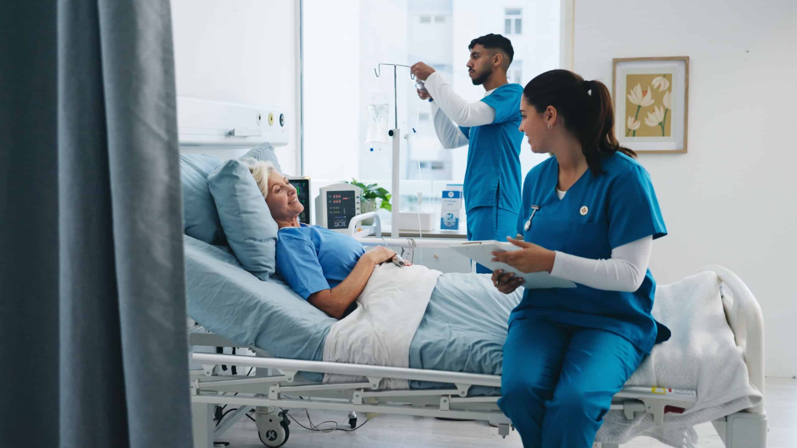 Nurse, clipboard and happy old woman in hospital bed for medical assessment, good news or recovery. Healthcare staff, senior patient and worker with health report for healing update or monitor vitals