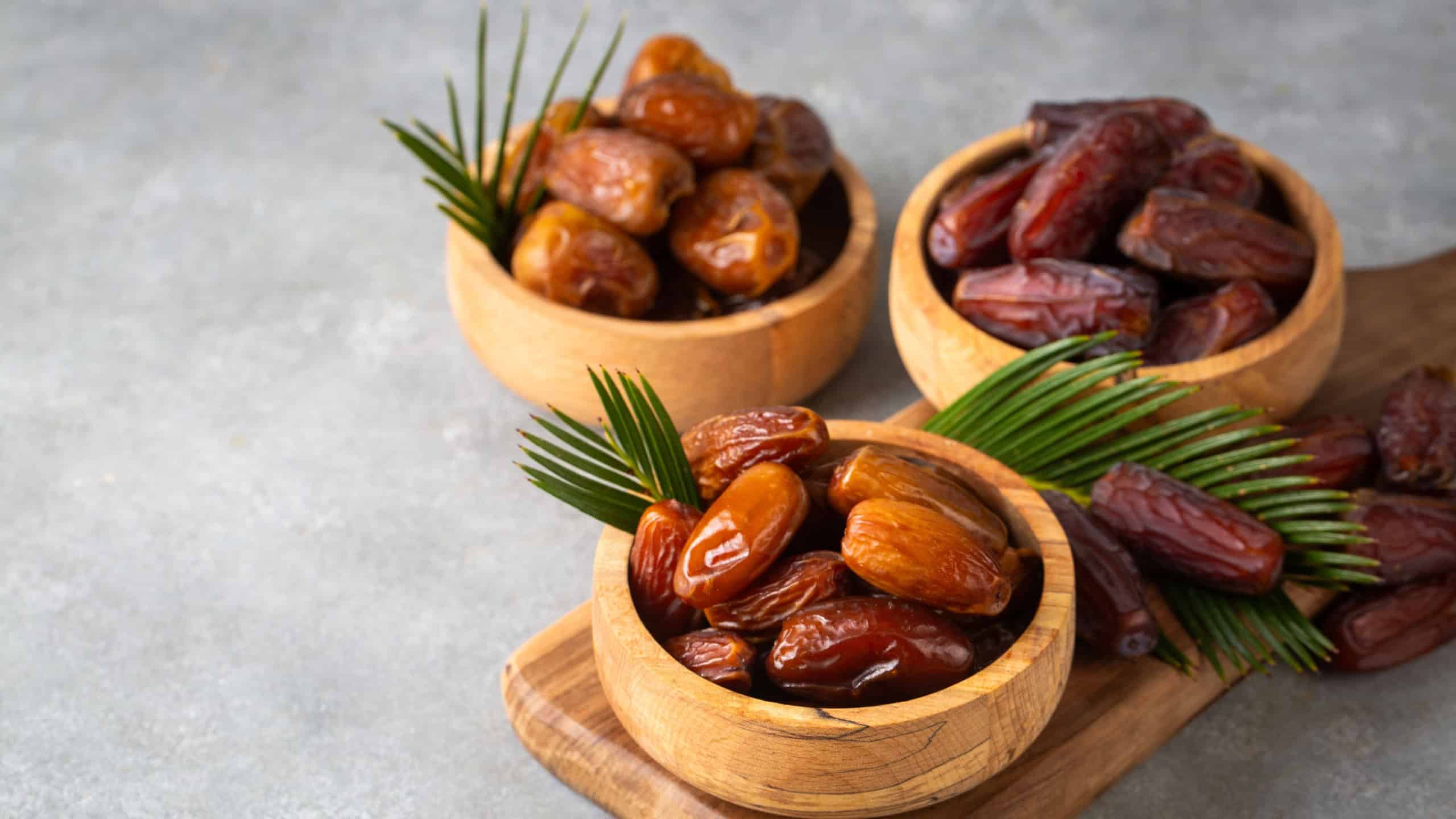 Dried date fruit in the plate. Ramadan dates fruit